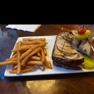 Got a rueben sandwhich Im excited to try it out! and the fries look delicious. Although the pepper on top of it is weird but cool!