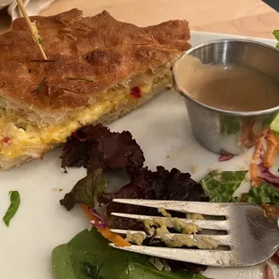 Grilled Pimento Cheese on sourdough with a side salad.