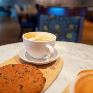 a cookie and a cup of coffee