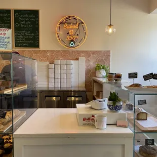 a counter with a variety of pastries