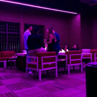 a group of people sitting at a table