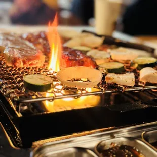 High style grill, pork belly , 356 beef marinated. 3 side tray. Soy-spicy red sauce and GREEN salt