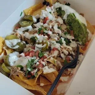 Nachos in takeout box