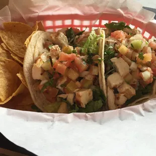 Two chicken soft tacos.