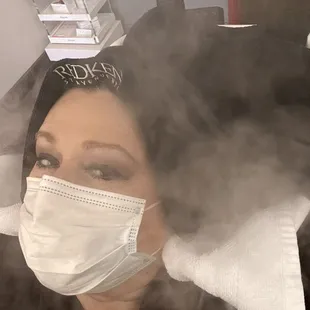 Steam treatment for hair cuticles to promote shine.