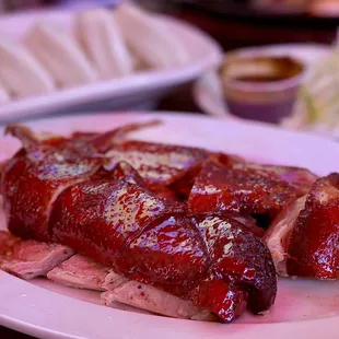COVID OUTDOOR DINING: Vịt Bắc Kinh - Peking Duck w/ steamed buns | 1/2 order-$18 (excuse the red tint from the umbrella)