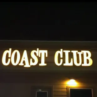 the sign for coast club