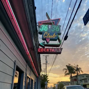 a neon sign on a building