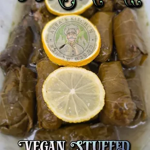 a plate of stuffed grape leaves