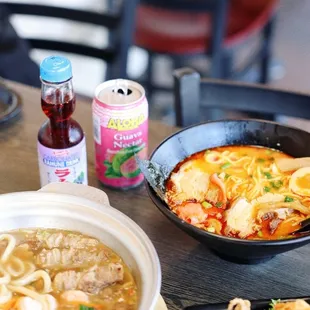 a bowl of ramen and a bowl of noodles