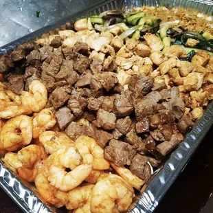 Shrimp, steak, and chicken hibachi