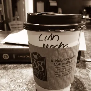 a cup of coffee on a counter