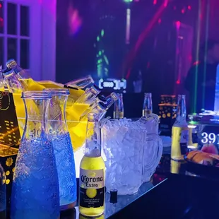 a bar with a variety of drinks