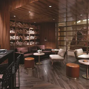 a living room with wood paneled walls