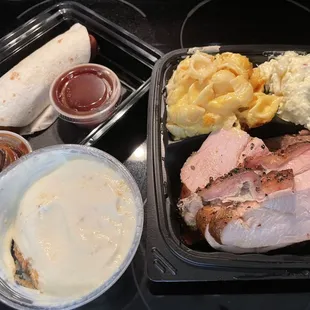 Sausage wrap, banana pudding and two meat plate.