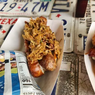 a hot dog and a bag of chips