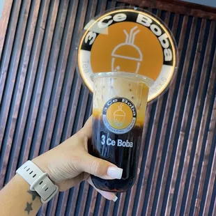 Thai milk tea with brown sugar boba and coffee jelly