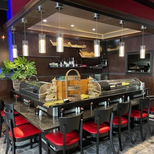 a restaurant with a long counter