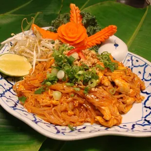 a plate of noodles and vegetables