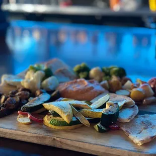 Grilled potatoes, Brussel sprouts, zucchini &amp; squashes, naan &amp; homemade hummus.