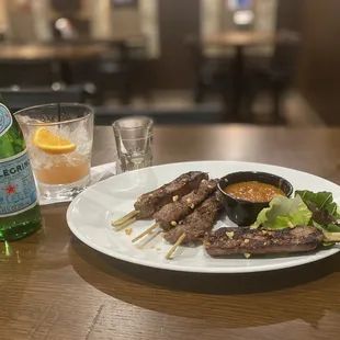 Steak Skewers, Shot of Don Julio Anejo, Kettle One Vodka and cranberry with a side of Pellegrino!