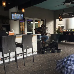 a man sitting at a bar