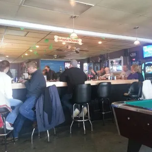 people sitting at the bar