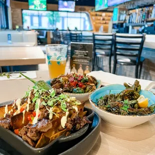 Vertical nachos, Brussels sprouts, shishito peppers