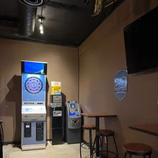 Dartboard change machine and ATM convenient.