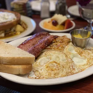 eggs, bacon, toast, and toast