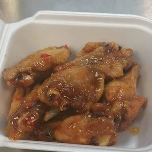 chicken wings in a styrofoam container