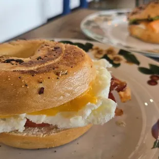 OG breakfast bagel, subbed out the American cheese for cheddar. There is a little bacon in there, you just can't see it.