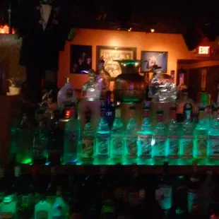 bottles of alcohol on a bar counter