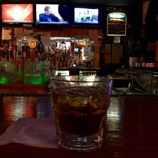 a shot of a drink on the bar