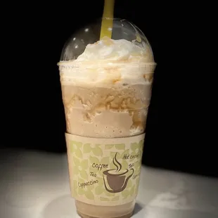 a cup of coffee with whipped cream