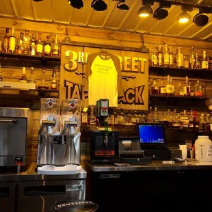 a bar with a lot of bottles