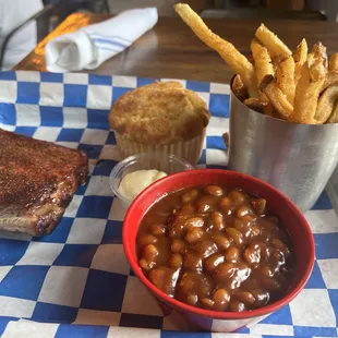 1/4 rack of pork spare ribs with fries, baked beans and a corn muffin. 10/10. This is the best barbecue in MN!