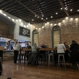 people sitting at the bar