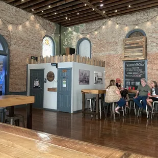 a group of people sitting at tables