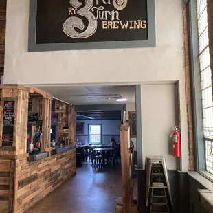 Tables and couches in the back