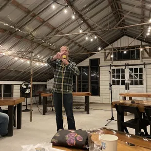 a man speaking into a microphone