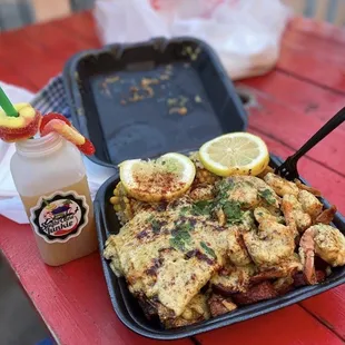 Salmon and Shrimp Plate, with a Sugar Cane Junkie drink.