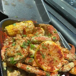Lobster crab and shrimp plate . I only like lobster don&apos;t care for the sauce or anything else on my plate.
