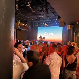 a crowd of people at a party