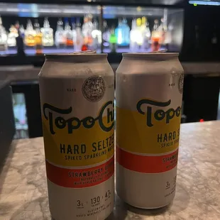 two cans of topo hard selt