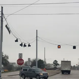 a stop sign and a truck