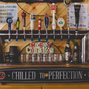 a bar with a variety of beer taps