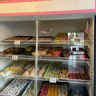 a display case full of donuts