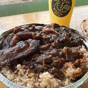 a plate of rice and meat