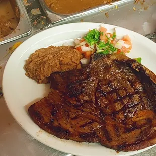 T.bone la parrilla.y mucho más